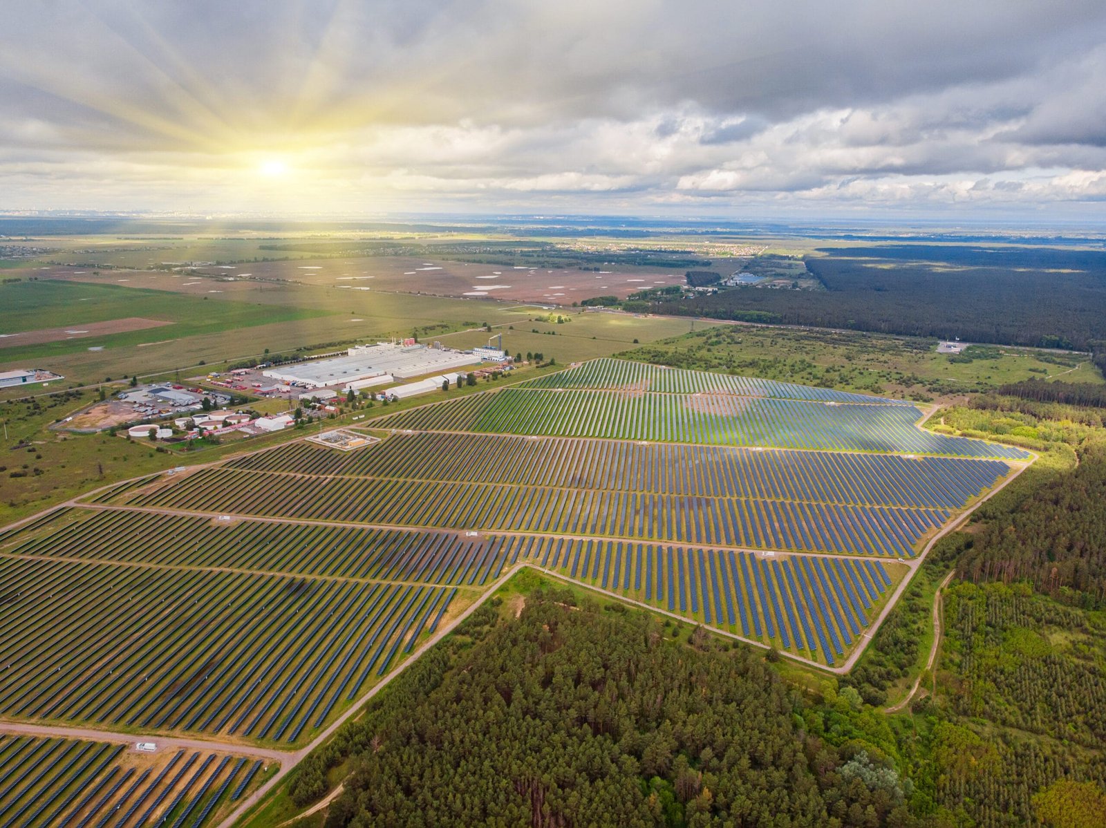 Solar power plant in the field. Aerial view of Solar panels. Solar farm. The source of ecological renewable energy.